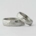 snubní prsteny z chirurgické oceli a moissanite 2 mm vsazený do stříbra - dámský velikost 50, šířka 4,5 mm, matný, profil B a pánský velikost 66, šířka 6 mm, matný, profil B - k 2360